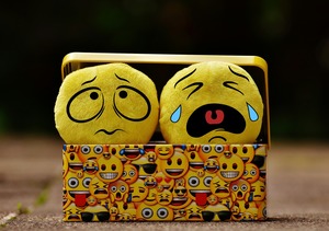 box of emoticons unhappy sad crying faces 