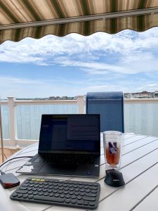 Jennifer's laptop working on deck looking Barnegat Bay NJ 