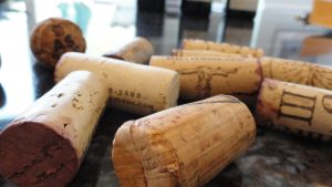 Assorted wine corks on kitchen counter 